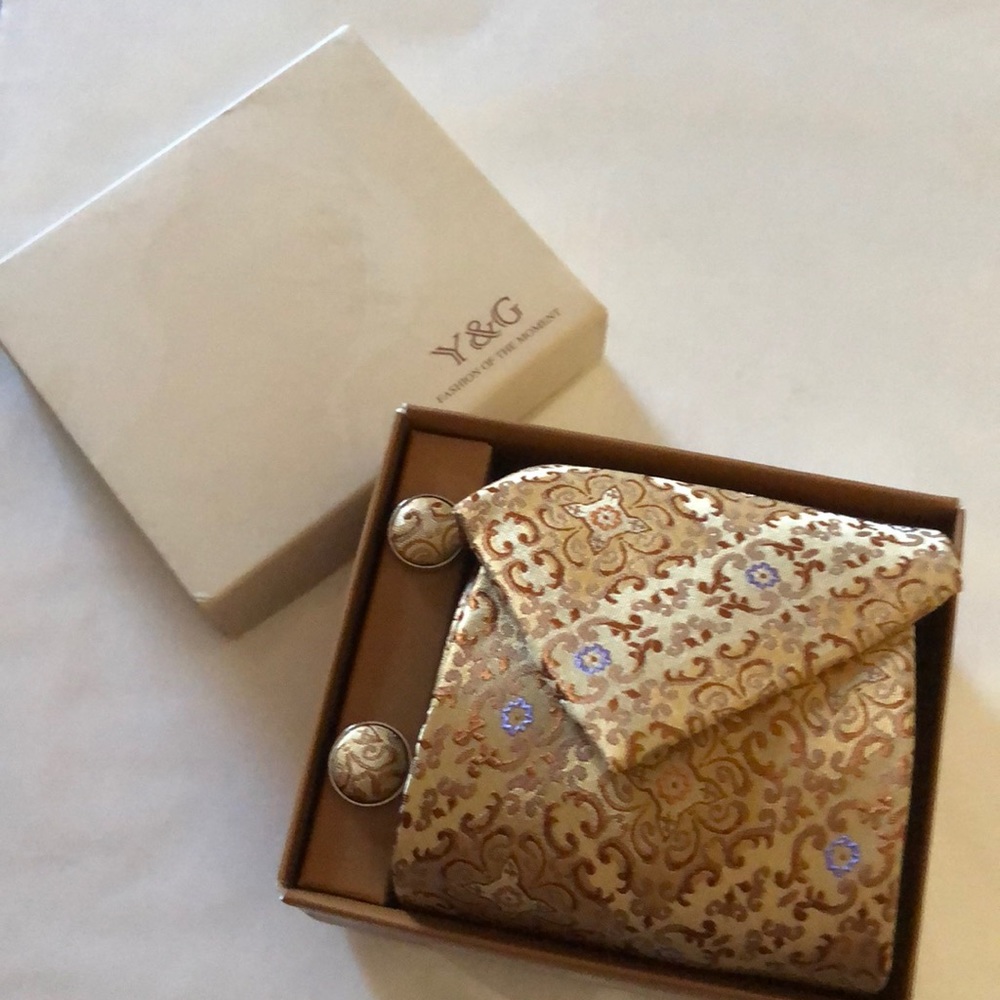Gold , silver tie, cuff links, pocket square
